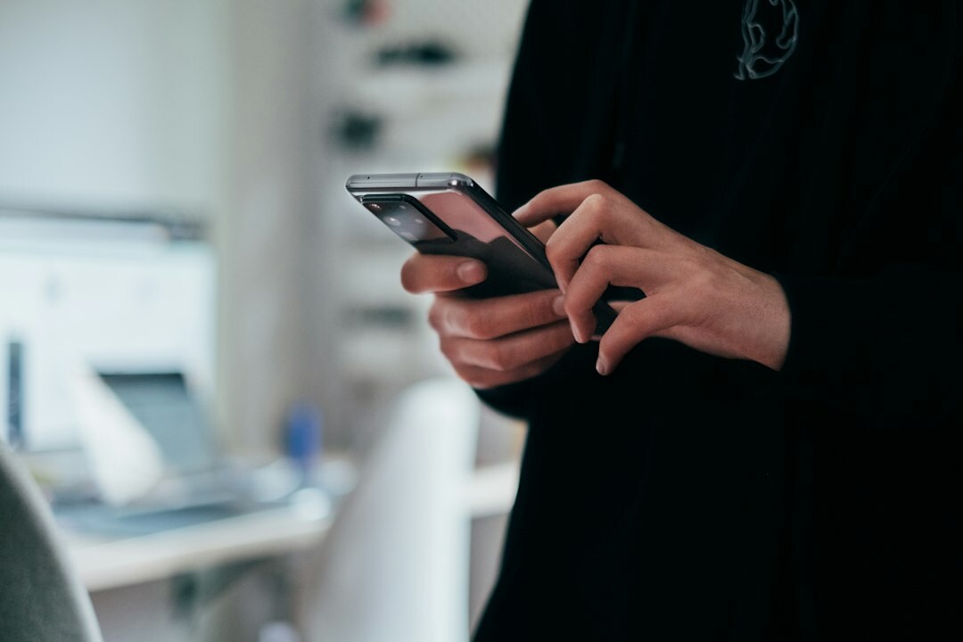 teenager scrolling phone